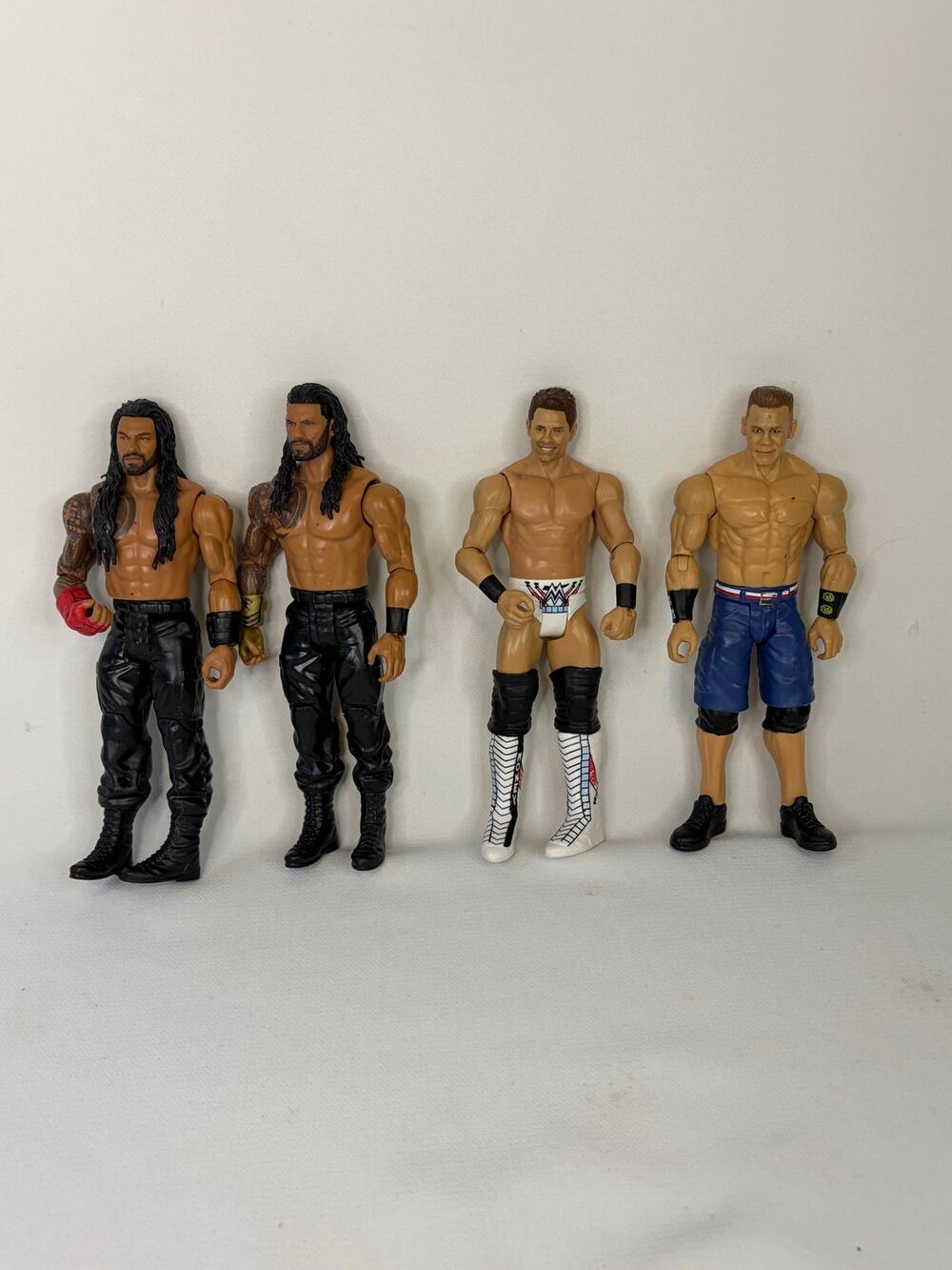 WWE 2017 Action Figure Lot of 4 Roman Reigns, The Miz, and John Cena